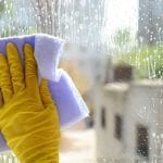 Cleaning windows with special rag