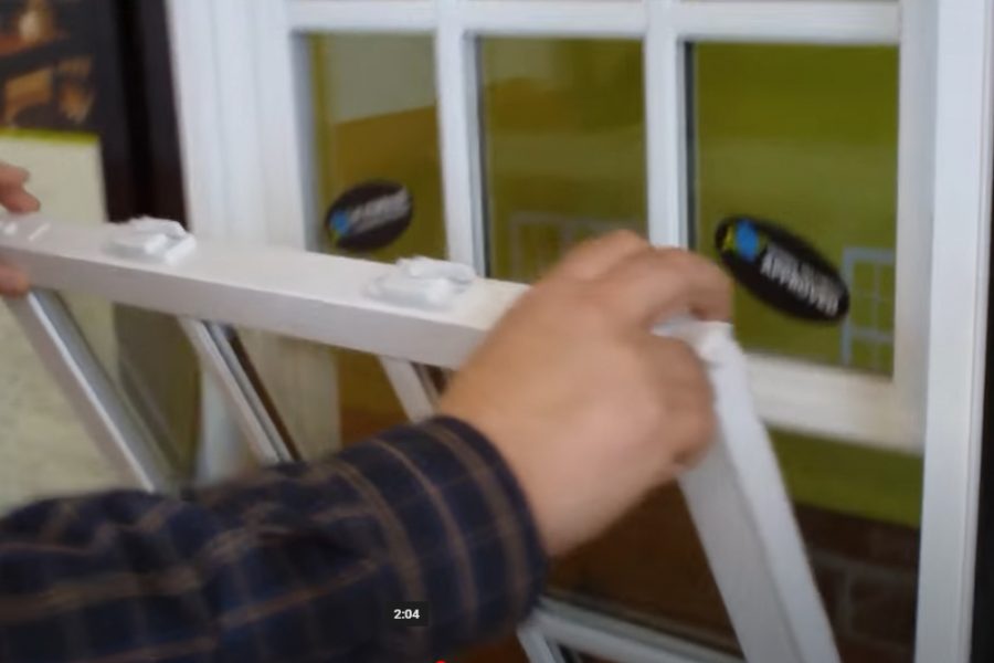 How do I tilt in my Smarter window to clean it?